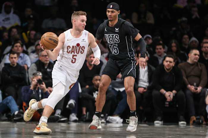 Feb 8, 2024; Brooklyn, New York, USA; Cleveland Cavaliers guard Sam Merrill (5) looks to drive past Brooklyn Nets guard Keon Johnson (45) in the fourth quarter at Barclays Center. Mandatory Credit: Wendell Cruz-USA TODAY Sports